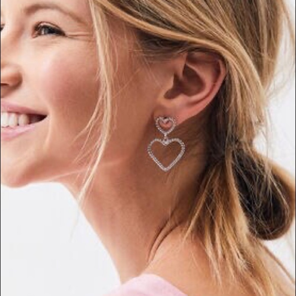 La hearts silver beating heart earrings